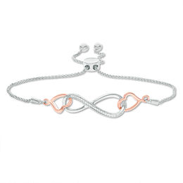 0.04 CT. T.W. Diamond Interlocking Sideways Heart and Infinity Bolo Bracelet in Sterling Silver and 10K Rose Gold - 9.5&quot;