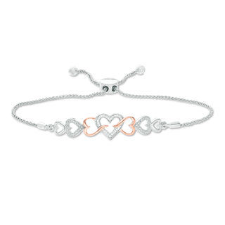 0.04 CT. T.W. Diamond Intertwining Sideways Heart Bolo Bracelet in Sterling Silver and 10K Rose Gold - 9.5"