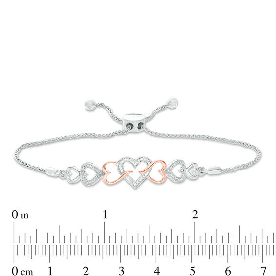 0.04 CT. T.W. Diamond Intertwining Sideways Heart Bolo Bracelet in Sterling Silver and 10K Rose Gold - 9.5"