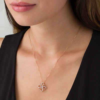 0.145 CT. T.W. Diamond Clover Heart Knot Pendant in 10K Rose Gold