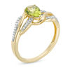 Pear-Shaped Peridot and 0.069 CT. T.W. Diamond Wave Ring in 10K Gold