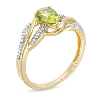 Pear-Shaped Peridot and 0.069 CT. T.W. Diamond Wave Ring in 10K Gold