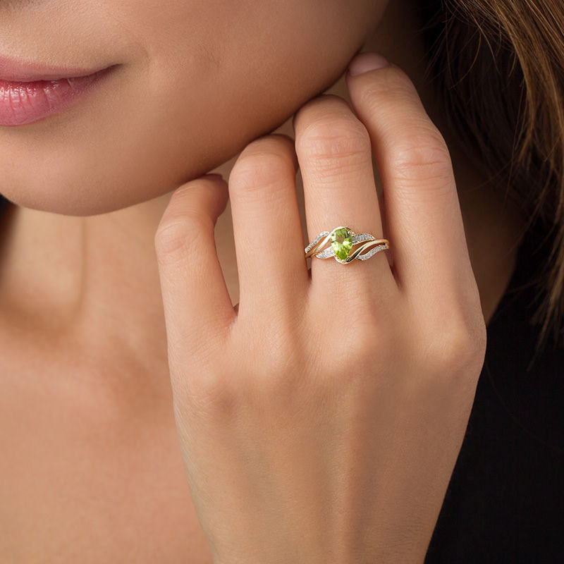 Main Image 3 of Pear-Shaped Peridot and 0.069 CT. T.W. Diamond Wave Ring in 10K Gold