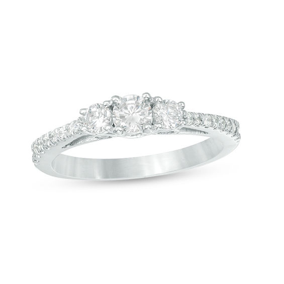 0.58 CT. T.W. Diamond Three Stone Engagement Ring in 10K White Gold