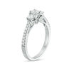 0.58 CT. T.W. Diamond Three Stone Engagement Ring in 10K White Gold