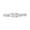 0.58 CT. T.W. Diamond Three Stone Engagement Ring in 10K White Gold