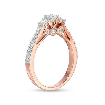 0.58 CT. T.W. Diamond Three Stone Engagement Ring in 10K Rose Gold