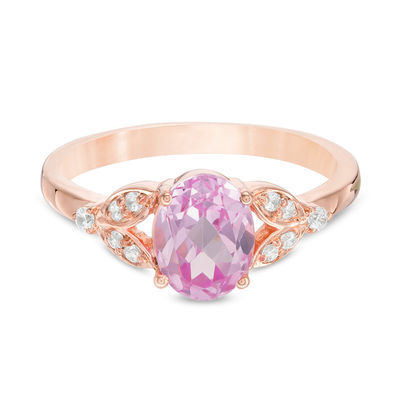 Oval Lab-Created Pink Sapphire and 0.086 CT. T.W. Diamond Leaf Sides Ring in 10K Rose Gold