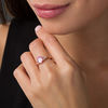 Oval Lab-Created Pink Sapphire and 0.086 CT. T.W. Diamond Leaf Sides Ring in 10K Rose Gold