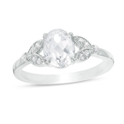 Oval Lab-Created White Sapphire and 0.086 CT. T.W. Diamond Leaf Sides Ring in Sterling Silver