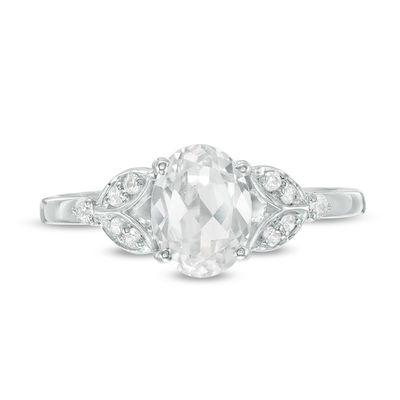 Oval Lab-Created White Sapphire and 0.086 CT. T.W. Diamond Leaf Sides Ring in Sterling Silver