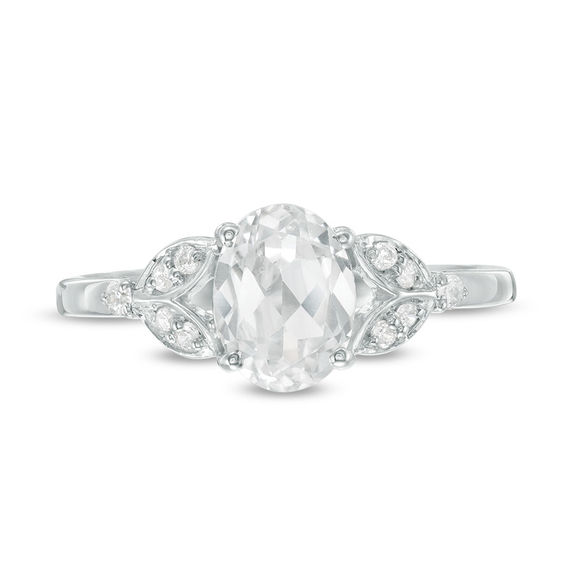 Oval Lab-Created White Sapphire and 0.086 CT. T.W. Diamond Leaf Sides Ring in Sterling Silver