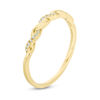 0.05 CT. T.W. Diamond Twist Wedding Band in 10K Gold