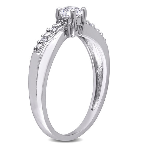 4.0mm Lab-Created White Sapphire and 0.04 CT. T.W. Diamond Crossover Promise Ring in Sterling Silver