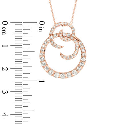 Lab-Created White Sapphire and 0.20 CT. T.W. Diamond Spiral Circle Pendant in 10K Rose Gold