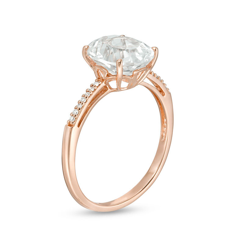 Oval Lab-Created White Sapphire and 0.04 CT. T.W. Diamond Ring in 10K Rose Gold