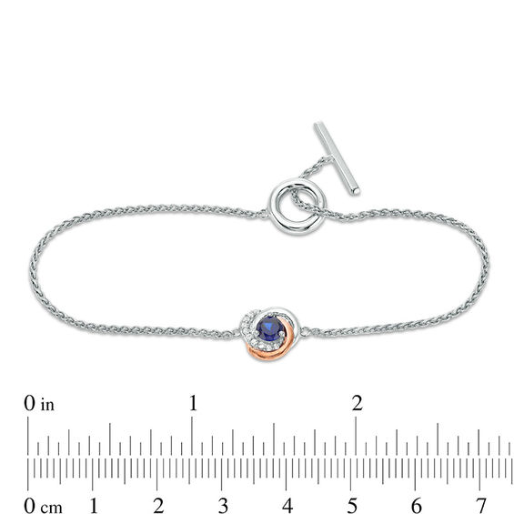 4.0mm Lab-Created Blue and White Sapphire Love Knot Toggle Bracelet in Sterling Silver and 10K Rose Gold - 7.25"