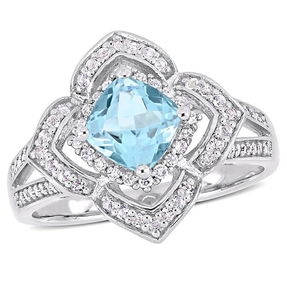 6.0mm Cushion-Cut Blue Topaz and 0.19 CT. T.W. Diamond Flower Frame Split Shank Ring in Sterling Silver