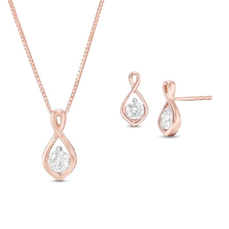 Main Image 1 of 0.45 CT. T.W. Diamond Solitaire Flame Twist Pendant and Stud Earrings Set in 10K Rose Gold