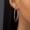 Thumbnail Image 1 of Italian Gold 10.0mm Oval Hoop Earrings in 14K Gold