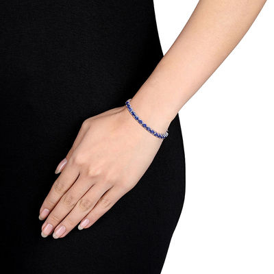 Sideways Oval Lab-Created Blue Sapphire Line Bangle in Sterling Silver