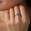 Thumbnail Image 1 of Pear-Shaped Blue Topaz and 0.065 CT. T.W. Black Diamond Tri-Sides Ring in Sterling Silver