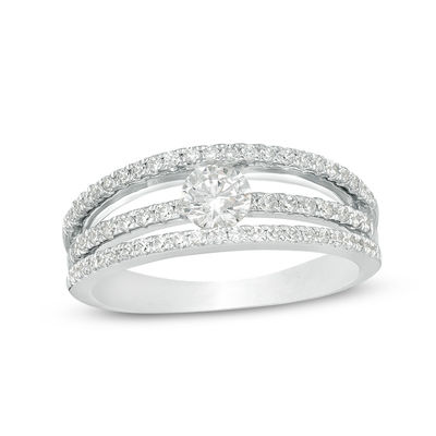 0.75 CT. T.W. Certified Canadian Diamond Orbit Engagement Ring in 14K White Gold (I/I2)