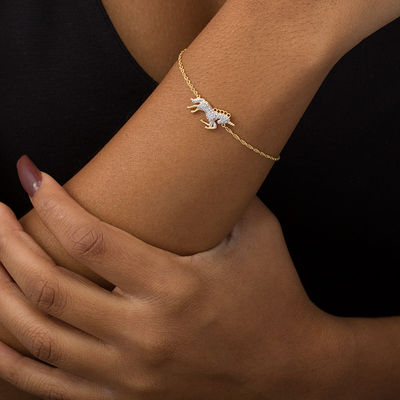 0.11 CT. T.W. Diamond Running Unicorn Bracelet in Sterling Silver with 14K Gold Plate - 7.5"