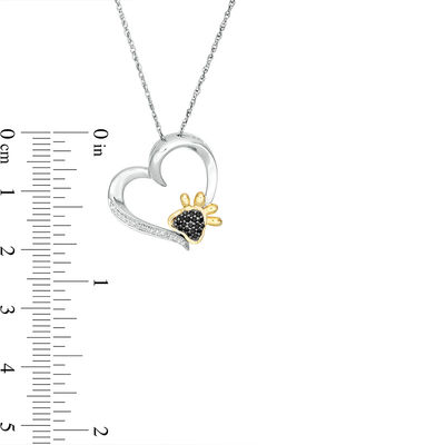 0.115 CT. T.W. Enhanced Black and White Diamond Paw Print Heart Pendant in Sterling Silver and 10K Gold