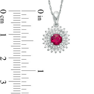 Lab-Created Ruby and 0.23 CT. T.W. Diamond Sunburst Frame Pendant in Sterling Silver