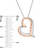 Thumbnail Image 2 of 0.04 CT. T.W. Diamond Tilted Double Heart Pendant in Sterling Silver and 10K Rose Gold