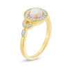 5.5mm Lab-Created Opal and 0.14 CT. T.W. Diamond Frame Vintage-Style Ring in 10K Gold