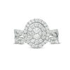 0.69 CT. T.W. Oval Multi-Diamond Double Frame Twist Bridal Set in 10K White Gold