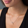 0.04 CT. T.W. Diamond Heartbeat and Cat Outline Dangle Necklace in Sterling Silver and 10K Gold