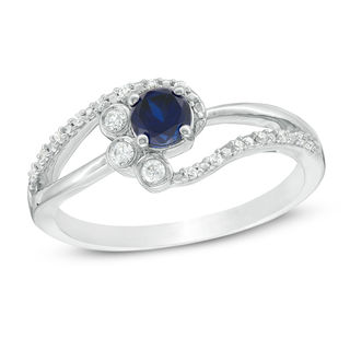 4.0mm Lab-Created Blue Sapphire and 0.065 CT. T.W. Diamond Bezel-Set Side Accent Bypass Promise Ring in Sterling Silver