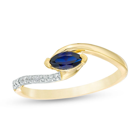 Sideways Marquise Lab-Created Blue Sapphire and Diamond Accent Bypass Promise Ring in 10K Gold