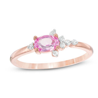 Oval Lab-Created Pink Sapphire and 0.065 CT. T.W. Diamond Side Accent Promise Ring in 10K Rose Gold