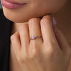 Thumbnail Image 1 of Oval Lab-Created Pink Sapphire and 0.065 CT. T.W. Diamond Side Accent Promise Ring in 10K Rose Gold