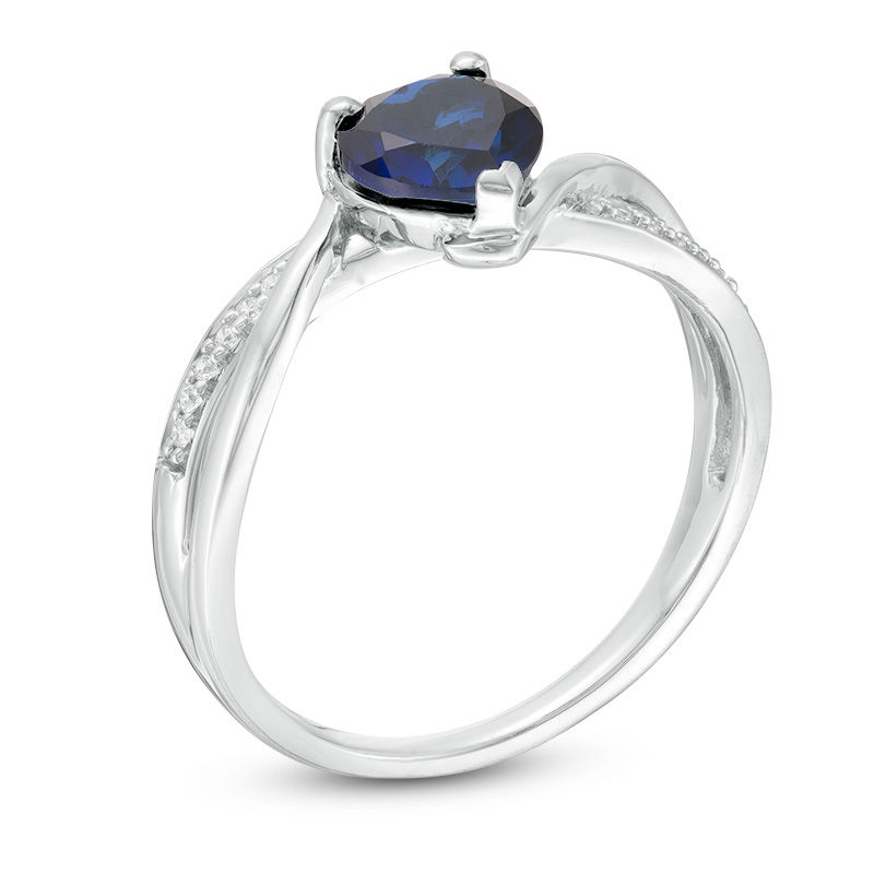 6.0mm Heart-Shaped Lab-Created Sapphire and 0.04 CT. T.W. Diamond Crossover Bypass Promise Ring in Sterling Silver|Peoples Jewellers