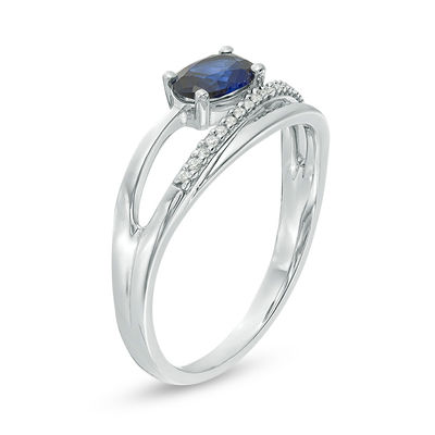 Sideways Oval Lab-Created Blue Sapphire and 0.04 CT. T.W. Diamond Crossover Ribbon Promise Ring in Sterling Silver