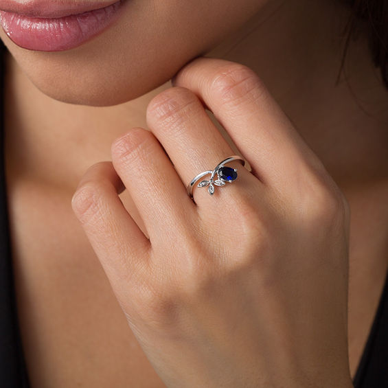 Oval Lab-Created Blue Sapphire and Diamond Accent Tri-Leaf Crossover Promise Ring in Sterling Silver