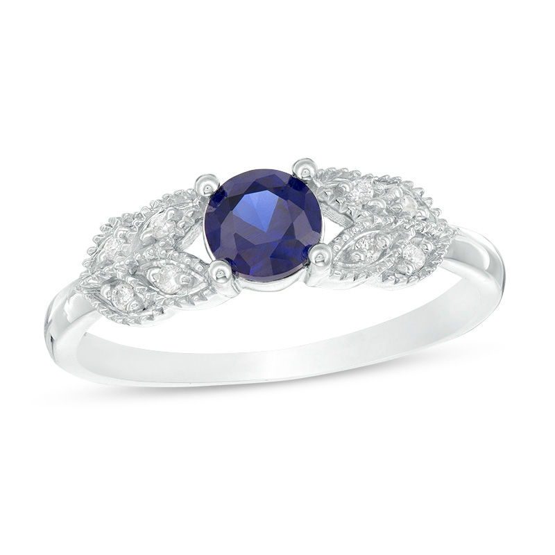 5.0mm Lab-Created Blue Sapphire and 0.04 CT. T.W. Diamond Leaf-Sides Vintage-Style Promise Ring in 10K White Gold|Peoples Jewellers