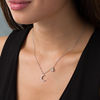 0.065 CT. T.W. Diamond Crescent Moon and Star Necklace in Sterling Silver