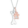 Diamond Accent Paw Print and Dog Bone Pendant in Sterling Silver and 14K Rose Gold Plate