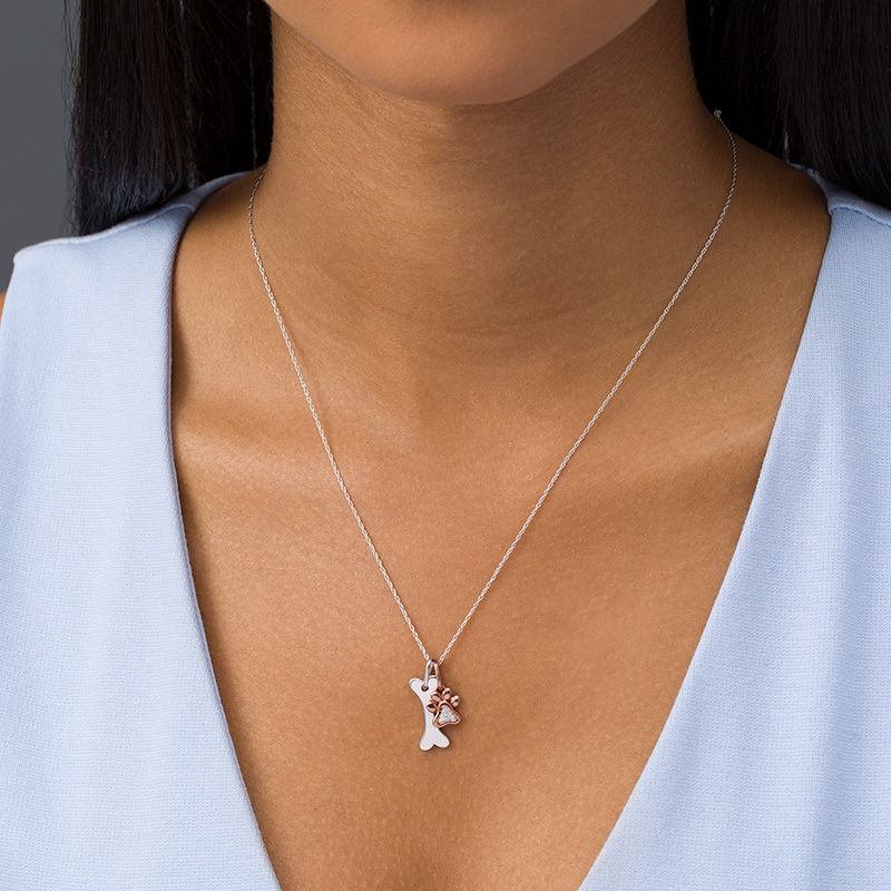 Diamond Accent Paw Print and Dog Bone Pendant in Sterling Silver and 14K Rose Gold Plate|Peoples Jewellers