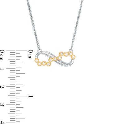 0.146 CT. T.W. Scattered Diamond Sideways Infinity Necklace in 10K Two-Tone Gold