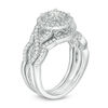 0.96 CT. T.W. Diamond Double Frame Twist Three Piece Bridal Set in 14K White Gold