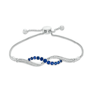 Lab-Created Blue and White Sapphire Infinity Bolo Bracelet in Sterling Silver - 9.5"