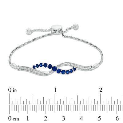 Lab-Created Blue and White Sapphire Infinity Bolo Bracelet in Sterling Silver - 9.5"