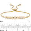 Thumbnail Image 1 of Graduating Bezel-Set Lab-Created White Sapphire Bolo Bracelet in Sterling Silver with 14K Gold Plate - 9.5"